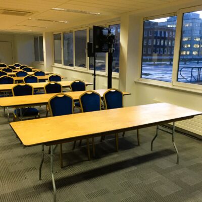 8ft Rectangular Table with Blue Padded Chairs