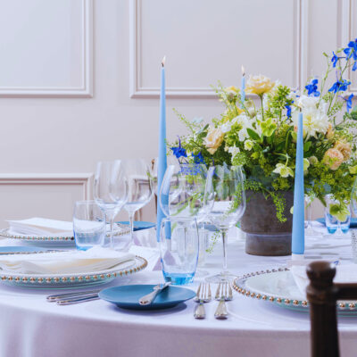 Riedel glassware with Blue Side Plates, Ice Blue Water Glasses and Silver Beaded Charger Plates